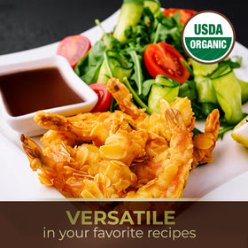 Marinating chicken or tofu with Kevala Coconut Aminos for flavorful, balanced meals