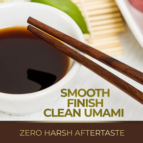Pouring Kevala Coconut Aminos into a bowl for a rich, low-sodium glaze