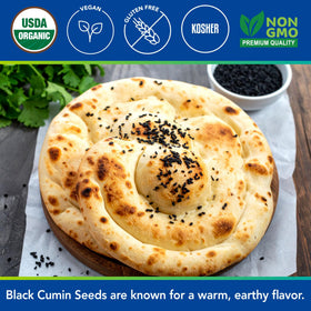 Kevala seeds with herbs like thyme and cilantro for versatile seasoning.