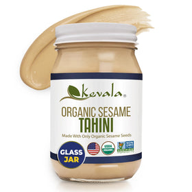 Kevala Organic Sesame Tahini in a glass jar pours smoothly for sauces and spreads.