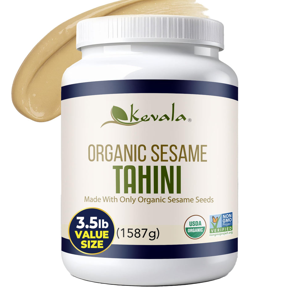 Kevala Organic Tahini jar side view showing creamy paste for versatile cooking