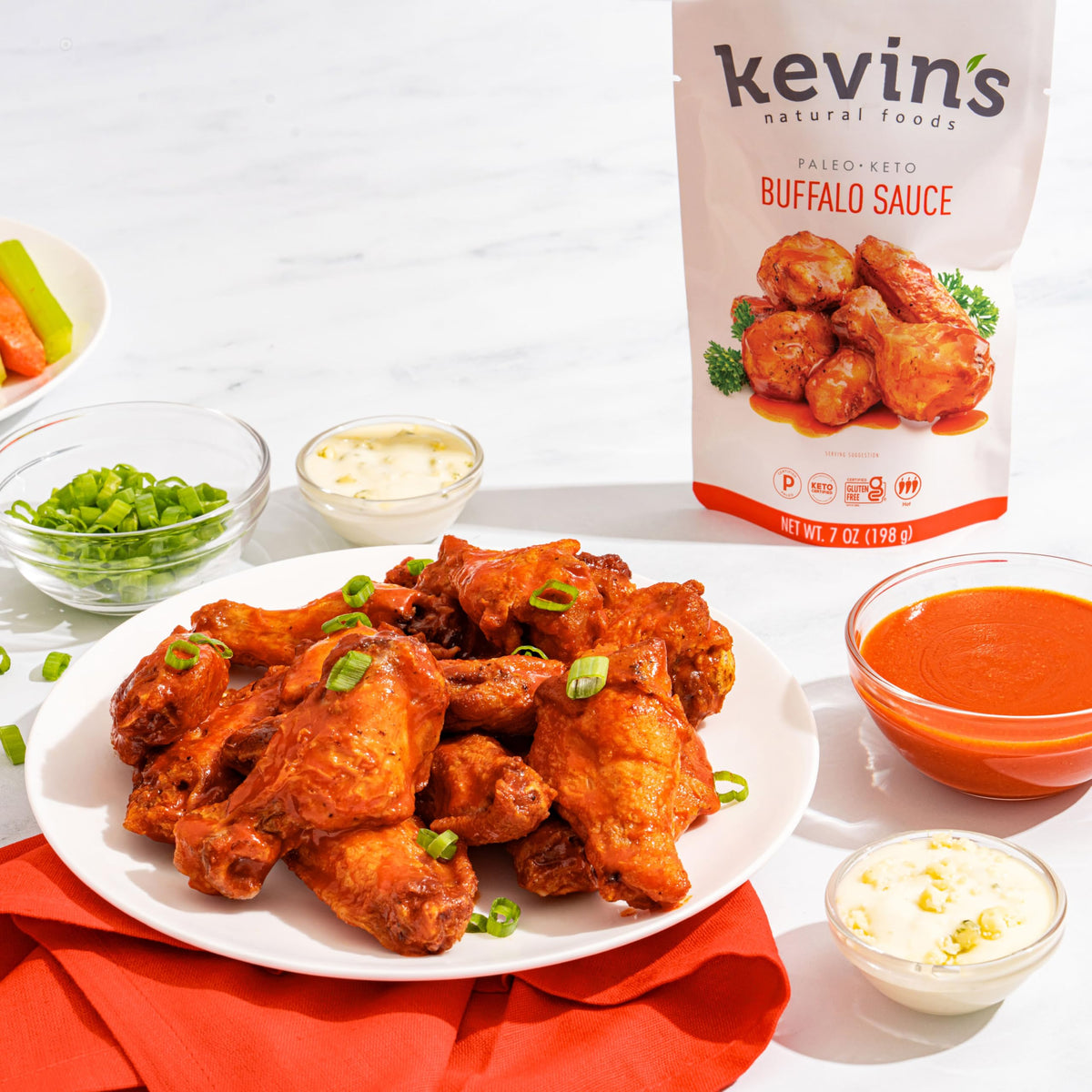 Kevin's Buffalo Sauce bottle pour captures tangy, spicy drizzle