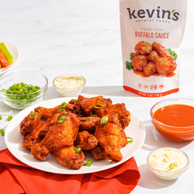 Kevin's Buffalo Sauce bottle pour captures tangy, spicy drizzle