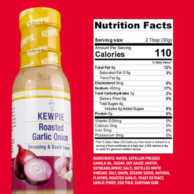 Kewpie Roasted Garlic Onion Dressing being poured over greens for vibrant flavor