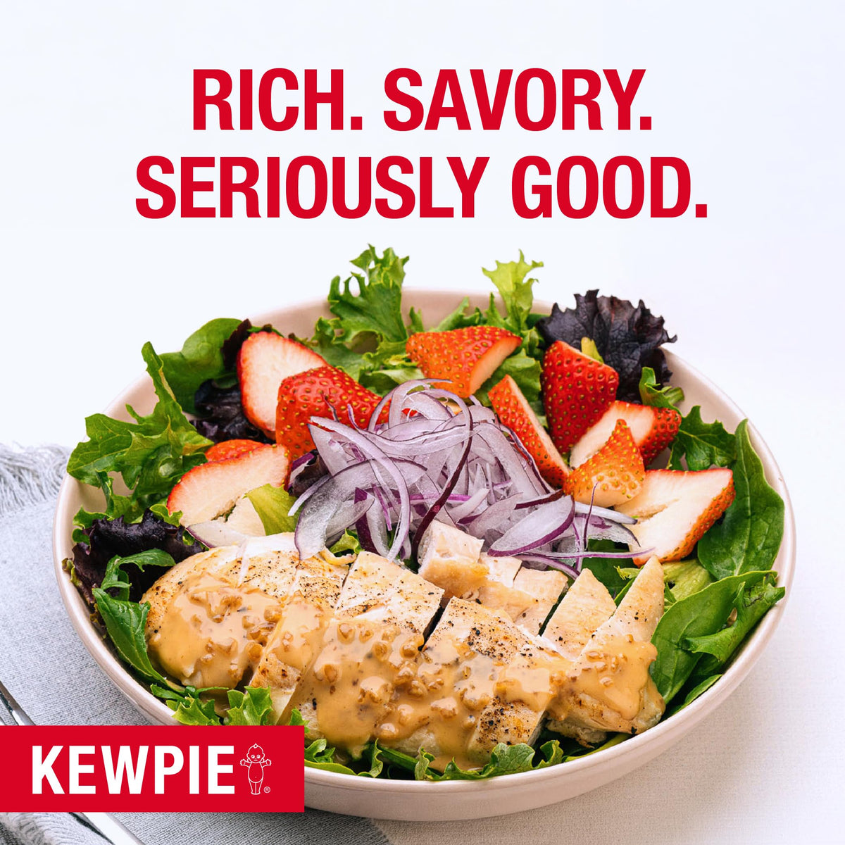 Kewpie Roasted Garlic Onion Dressing on a salad bowl adds savory depth