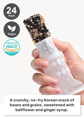 K Food Korean Food vegan black soybean snack bar closeup emphasizes crunchy texture and nutty flavor.