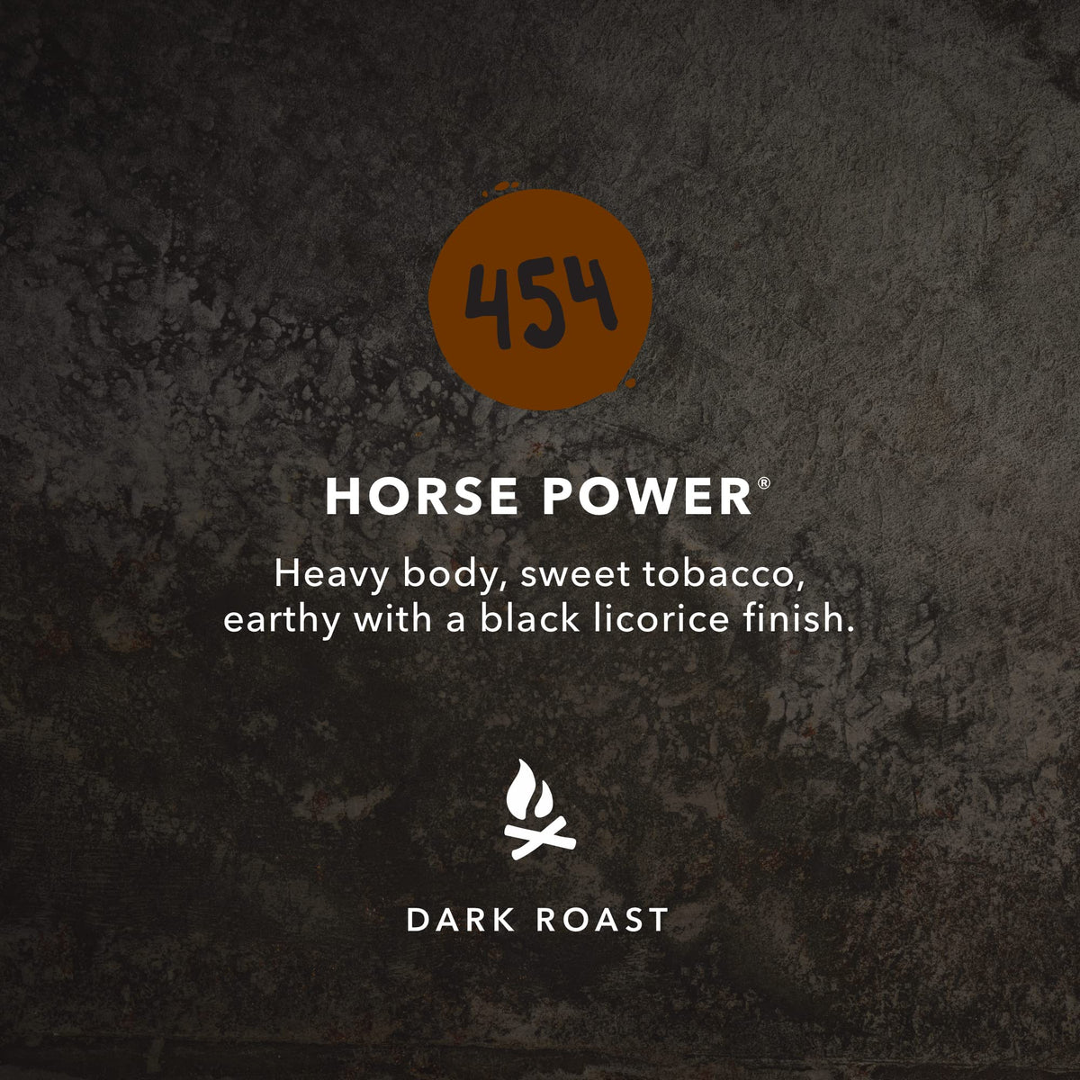 Kicking Horse 454 Horse Power coffee beans closeup highlighting rich aroma.