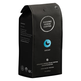 Kicking Horse decaf Swiss Water bag label highlights organic, fairtrade coffee with a smooth finish.