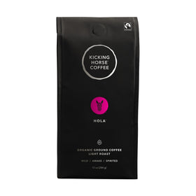 Kicking Horse Hola light roast ground coffee pack for a bright, quick morning brew.