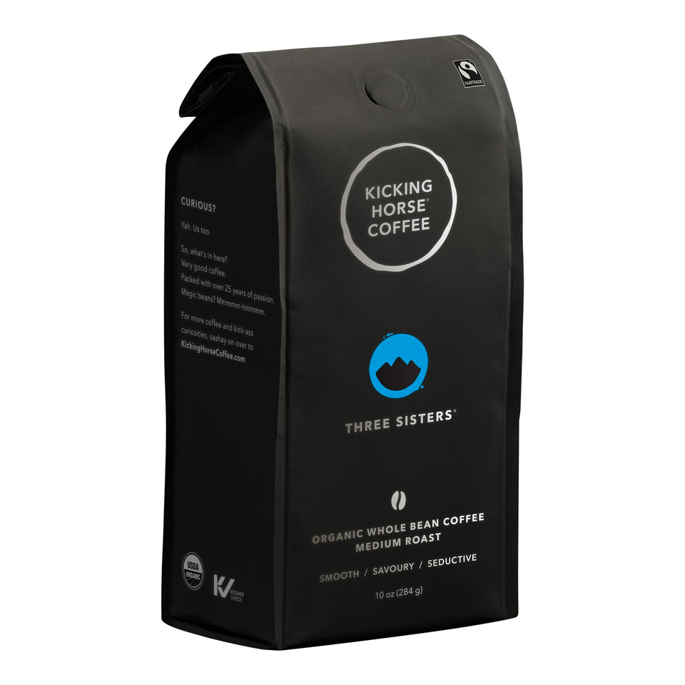 Kicking Horse Three Sisters whole bean coffee bag with balanced flavor.