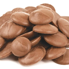 KIDU melted milk chocolate in a bowl for smooth, glossy coating.