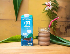 Shelf-stable packaging of Kiki Milk demonstrates pantry-friendly convenience.