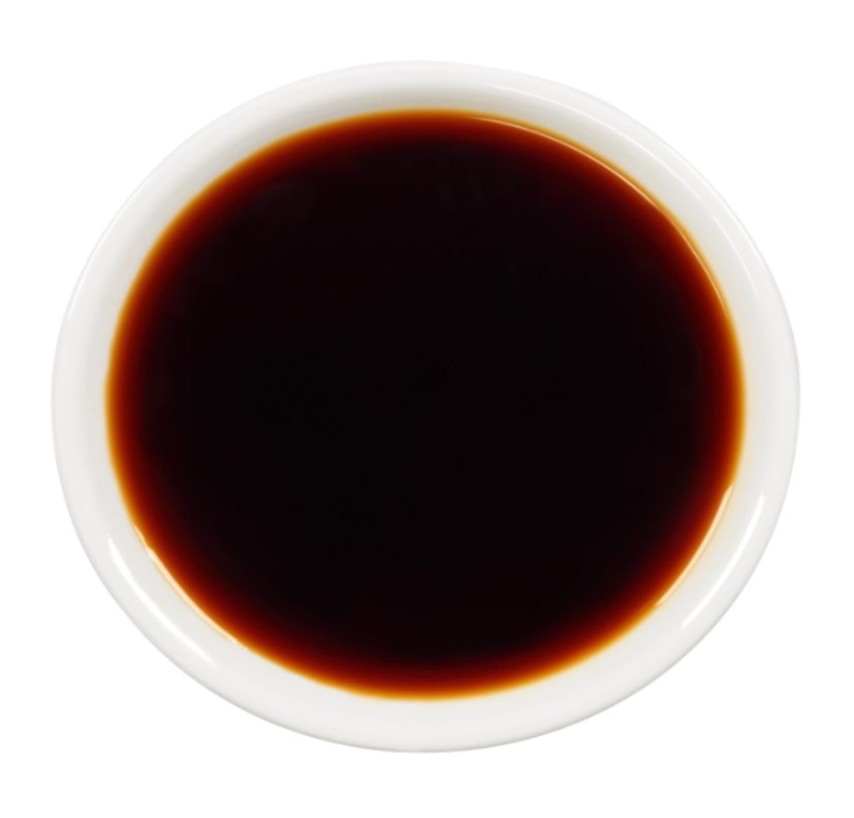 Kikkoman bottle beside stir-fry pan adds quick flavor boost