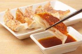 Kikkoman Gyoza Dipping Sauce plated dish demonstrates versatile dipping and finishing use
