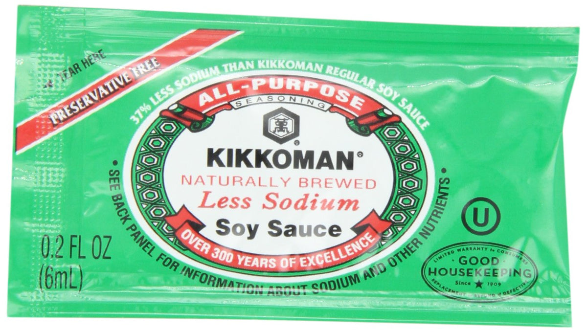 Kikkoman Less Sodium soy sauce packets packaging closeup for convenient, low-sodium seasoning on the go.