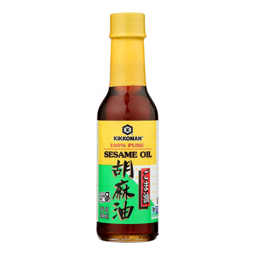 Kikkoman 2-pack sesame oil bottles front, adding nutty flavor to stir-fries and dressings.