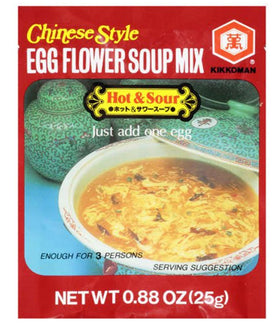 Beaten egg swirling in hot sour soup forms egg flower.