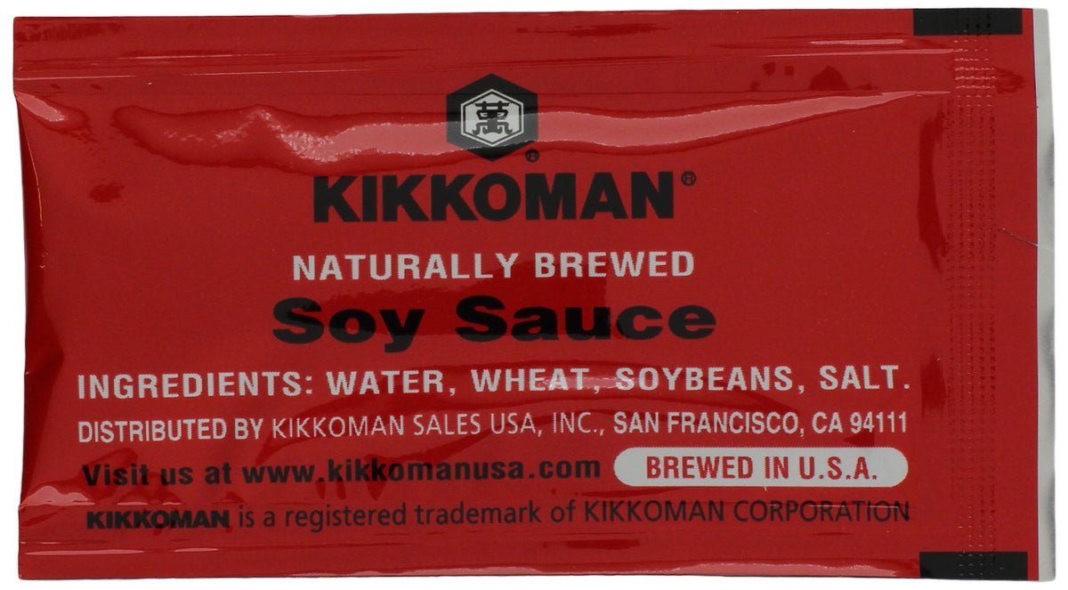 Close-up of Kikkoman Soy Sauce Packets showing naturally brewed flavor for dipping and seasoning
