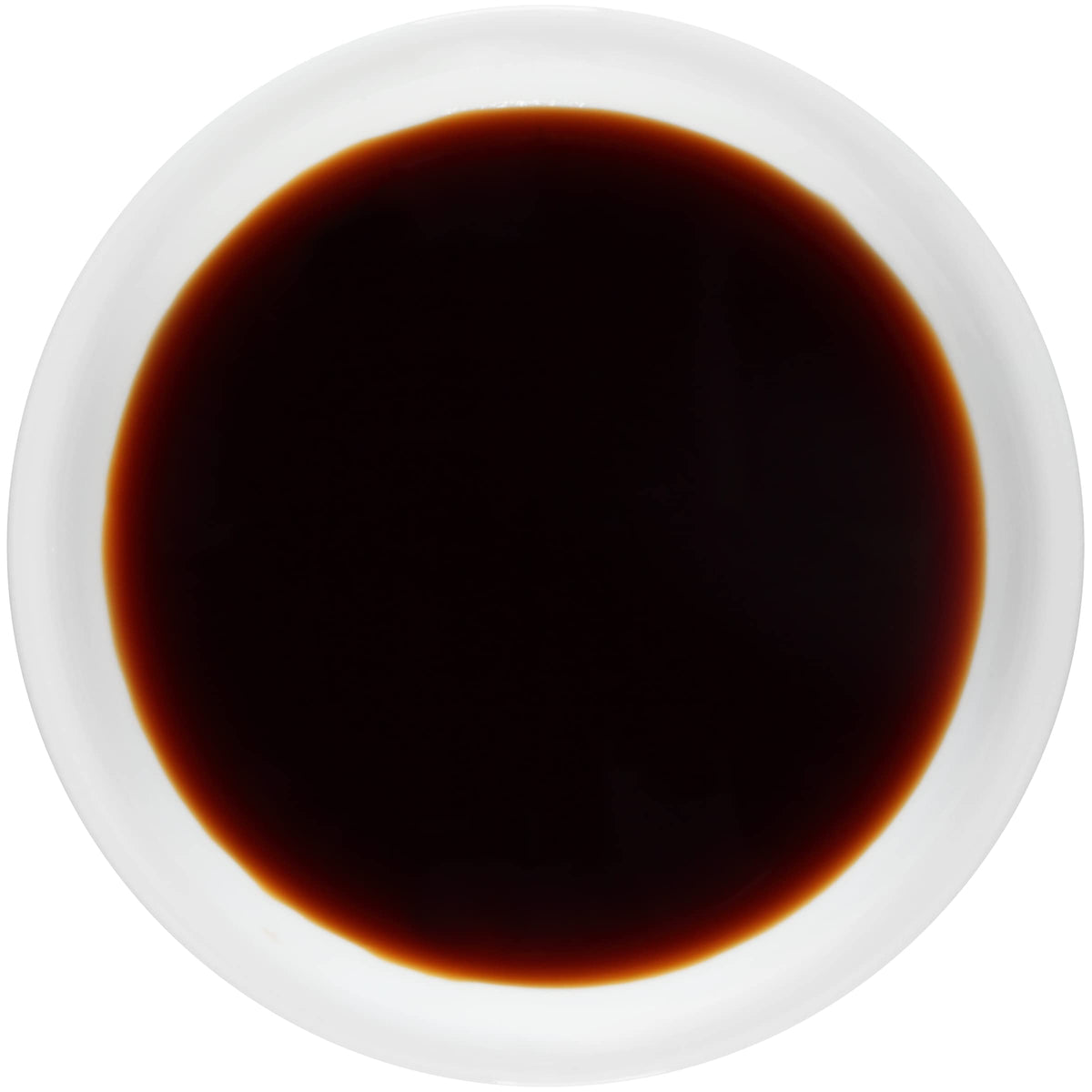 Kikkoman Tamari glaze on a sizzling stir-fry dish.