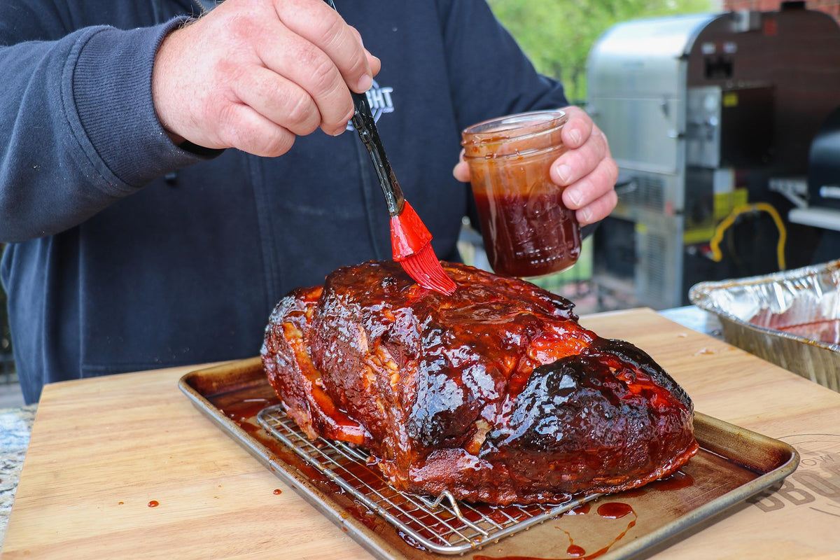 Pork ribs with glossy Killer Hogs BBQ glaze.