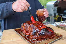 Pork ribs with glossy Killer Hogs BBQ glaze.