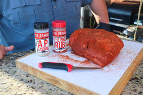 Killer Hogs Hot BBQ Rub bottle pouring for bold bark and mahogany color