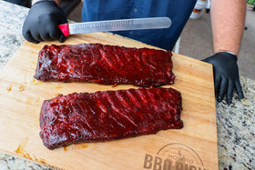 Killer Hogs HOT BBQ Rub chicken grill enhances tender poultry with aroma.