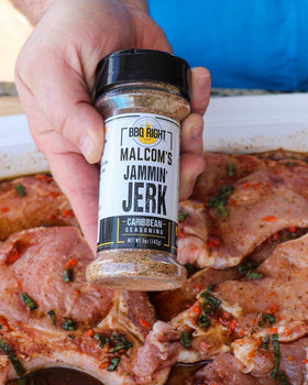 Killer Hogs Jammin' Jerk grill sizzle on prepared meat