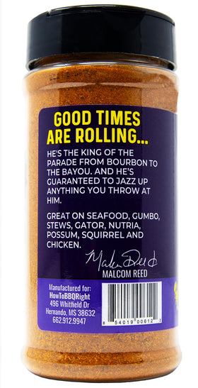 Killer Hogs Malcom's King Craw dispensing-spice on kitchen counter for easy Cajun meals.
