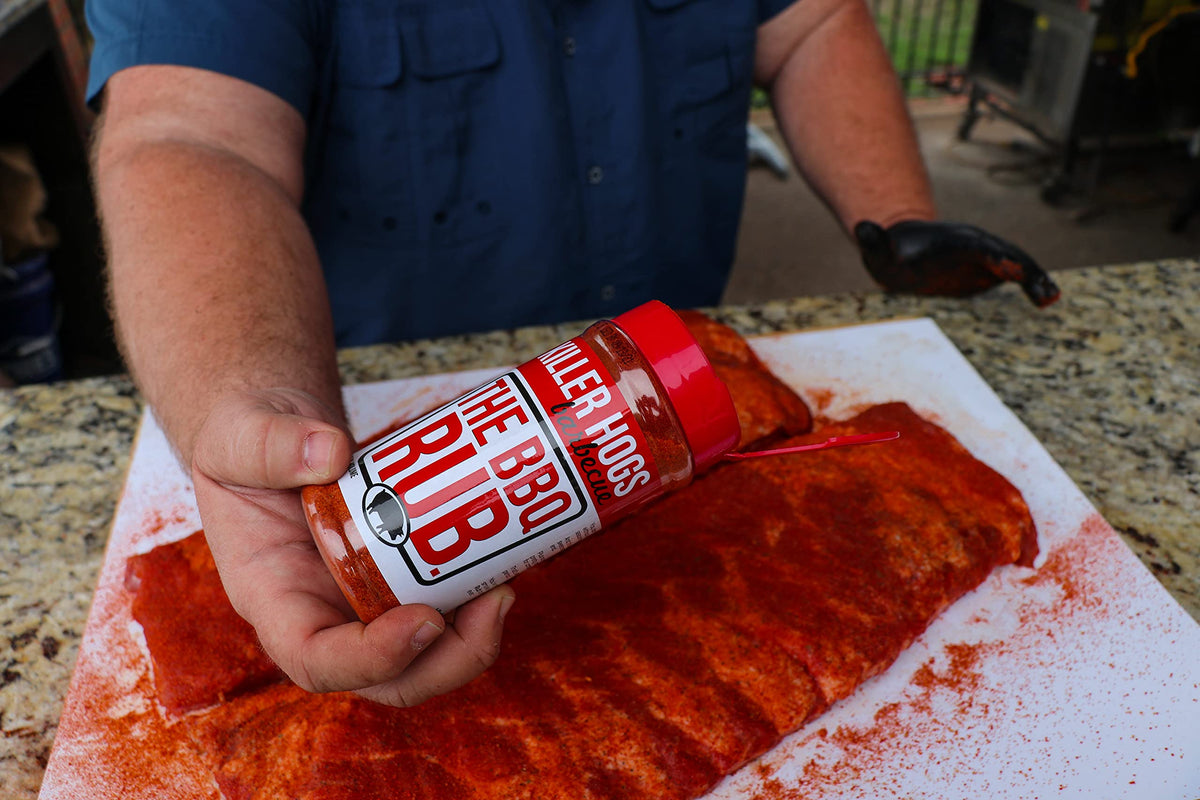 Killer Hogs The BBQ Rub on ribs on the grill for deep color