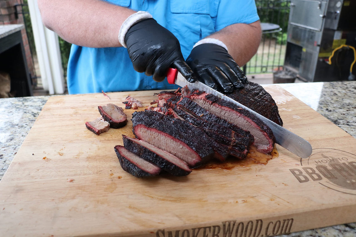 Killer Hogs TX Brisket Dry Rub on brisket prep for bold, smoky flavor.