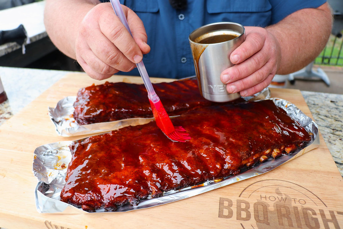 Killer Hogs Vinegar Sauce 2-Pack bottle pour for steak glaze