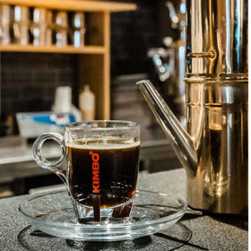Kimbo roasting drum image emphasizing slow, gentle process