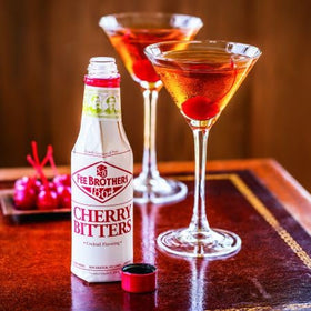 Fee Brothers Cherry Bitters on a home bar setup for crafting cocktails
