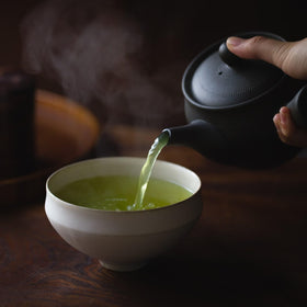 KIMIKURA vibrant green cup inviting calm ceremony and easy enjoyment