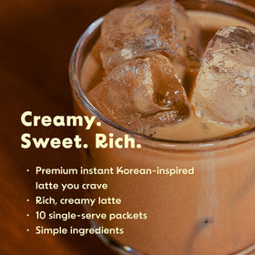 KimlyParc iced latte served in glass, refreshing vegan flavor on warmer days.