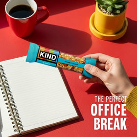 KIND Almond & Coconut bar individually wrapped for travel or work.