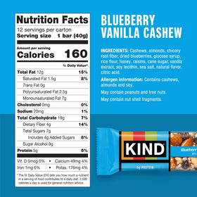 Close-up of a KIND Blueberry Vanilla Cashew bar showing crunchy cashews.