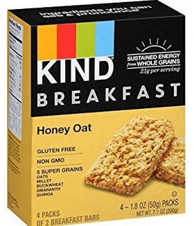 Kind Breakfast Bars on-the-go snack scene with coffee.