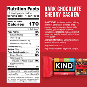 Close-up of KIND bars showing cashews, cherries, and dark chocolate for crunchy nutrition.