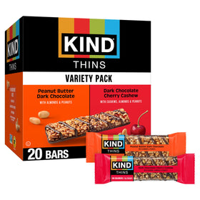 KIND THINS Dark Chocolate Cherry Cashew pack showcases gluten-free on-the-go snack.