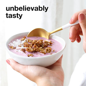 KIND ZERO Added Sugar Granola served over yogurt with fruit.