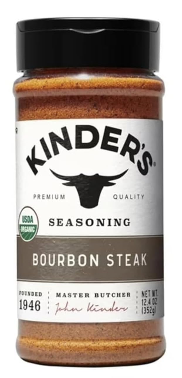 Kinder's Organic Bourbon Steak Seasoning jar enhances steaks with a rich, smoky flavor for grilling.