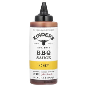 KINDER'S BBQ Honey SQZ bottle with a glossy glaze ready for grilling.
