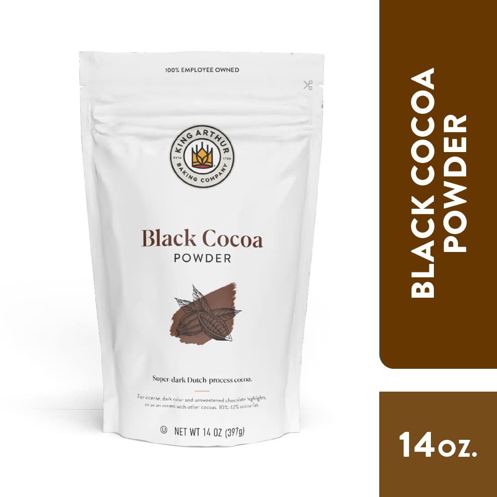 Close up of King Arthur Black Cocoa powder showing smooth texture and deep color