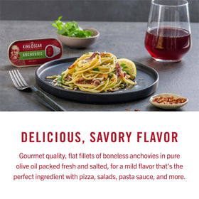 King Oscar anchovies on salad bowl demonstrates protein boost and flavor.