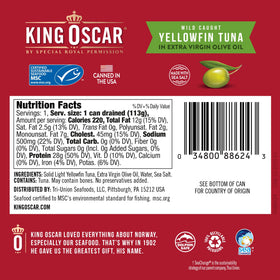 Opened King Oscar yellowfin tuna tin served with olive oil drizzle.