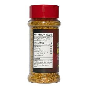 Texture close-up of King's Jamaican Scotch Bonnet flakes showing vibrant color and heat.