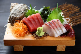 Kinjirushi Waner Wasabi Powder hydrated to form paste for sushi.