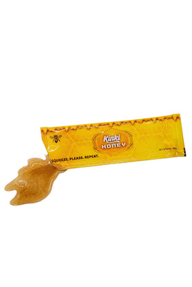 Kinki Honey Packs opened sachet releasing honey energy for a quick boost.